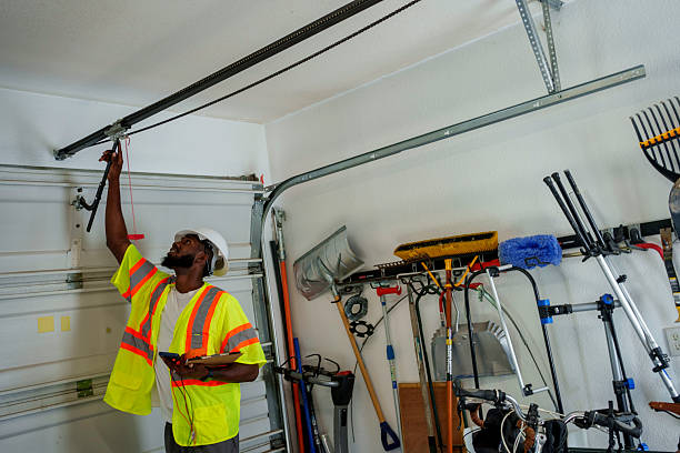 Professional Garage Door Panel Replacement technician working in Ogdensburg, NY